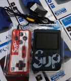 SUP Game Box je prikazan kao mini konzola sa kolekcijom elektronskih igara.