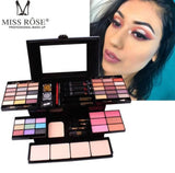 Set šminke Miss Rose sa senkama, rumenilima i ruževima za usne.