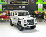 Mercedes-Benz AMG G63 u beloj boji prikazan kao metalni model.