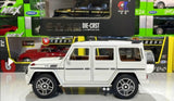 Beli AMG G63 metalni autić sa detaljima terenskog vozila.