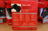 Crni karirani kontroler sa žičanom vezom, namenjen za Xbox 360.