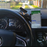 Prikazan je držač za mobilni telefon za upotrebu u automobilu.