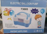 Električna pumpa namenjena pripremi balona za proslave prikazana je na slici.