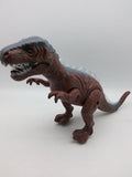 Na slici je igračka u obliku dinosaurusa T-Rex.