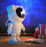 Prikazan je projektor u obliku astronauta za stvaranje svemirskog ambijenta.
