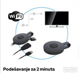 Bežični HDMI adapter ChromeCast za prikaz sadržaja sa telefona na televizoru.