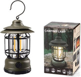 Retro kamp lampa sa metalnom kukom za kačenje.